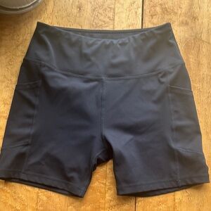 A core navy blue workout shirts with 2 pockets size medium